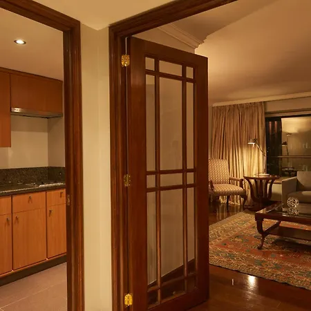 Plaza El Bosque Ebro Hotel Santiago Exterior photo A typical apartment at The Peninsula Manila